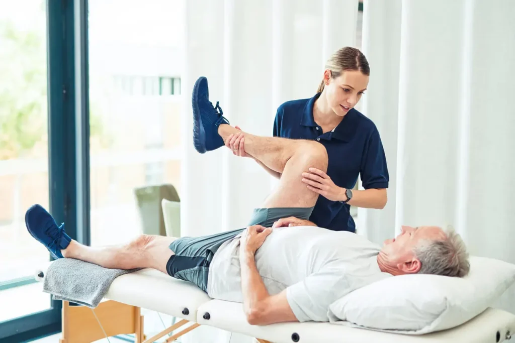 Revitalising Recovery: Effective Rehabilitation Strategies for Muscle Injuries 3 Physiotherapist assisting a patient with muscle recovery exercises Sevenoaks