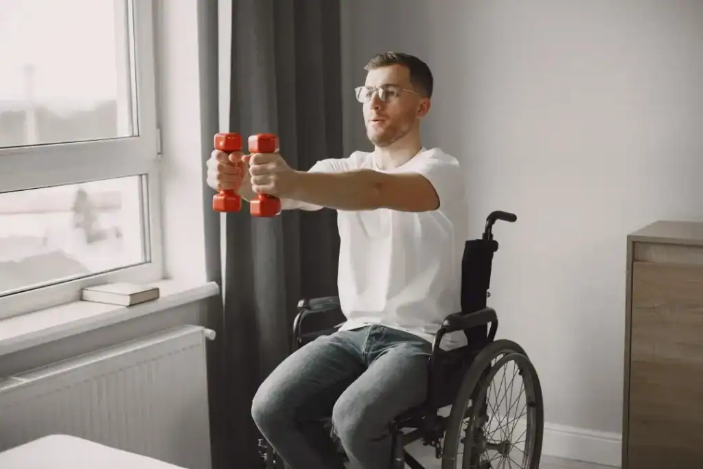 Image of man doing exercise in his wheelchair to aid weight loss Sevenoaks