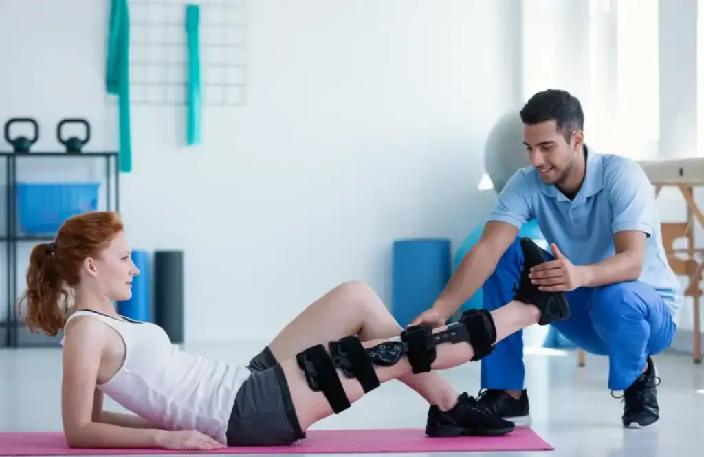 Woman having treatment to help muscle recovery Sevenoaks after an injury